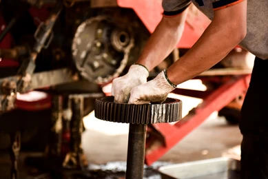 mechanic-repairing-tractor-used-agriculture-260nw-645477043